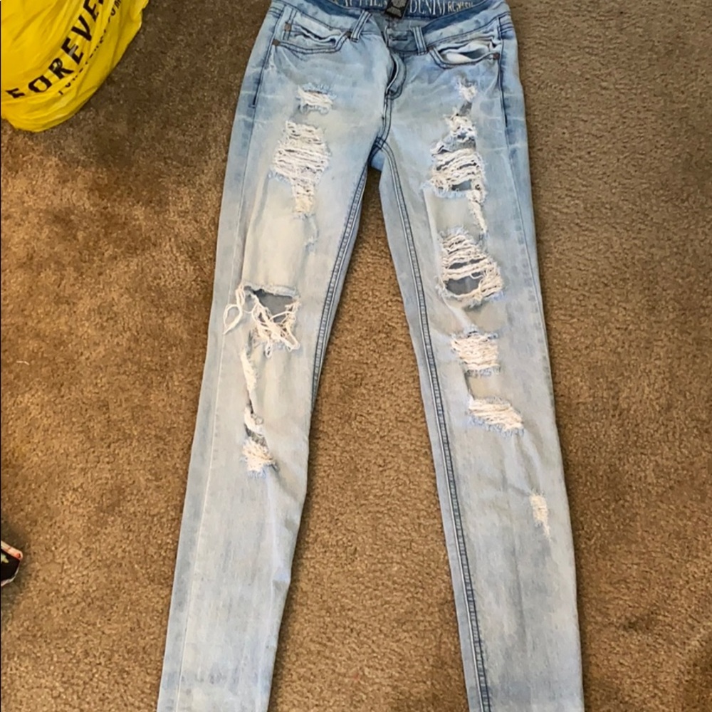light blue ripped jeans